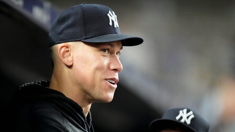 New York Yankees' Aaron Judge stands in the dugout in the eighth inning of a baseball game against the Seattle Mariners, Tuesday, June 20, 2023, in New York. (John Minchillo/AP)