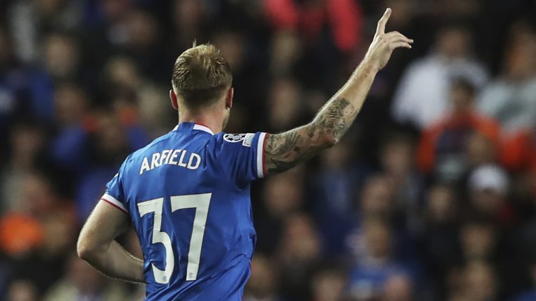 Rangers' Scott Arfield celebrates after scoring the opening goal during the Champions League Group A soccer match between Rangers and Liverpool at Ibrox stadium in Glasgow, Scotland, Wednesday, Oct. 12, 2022. (Scott Heppell/AP)