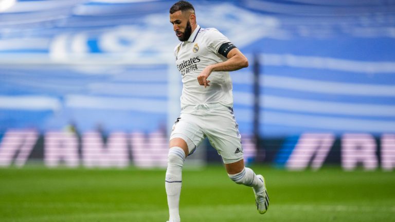 Real Madrid's Karim Benzema runs with the ball during their Spanish La Liga soccer match against Athletic Bilbao at the Santiago Bernabeu stadium in Madrid, Sunday, June 4, 2023. (Bernat Armangue/AP)