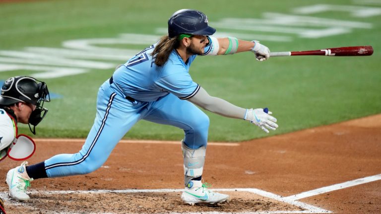 Toronto Blue Jays' Bo Bichette follows through on a single during the fourth inning of the team's baseball game against the Miami Marlins, Tuesday, June 20, 2023, in Miami. (Lynne Sladky/AP)