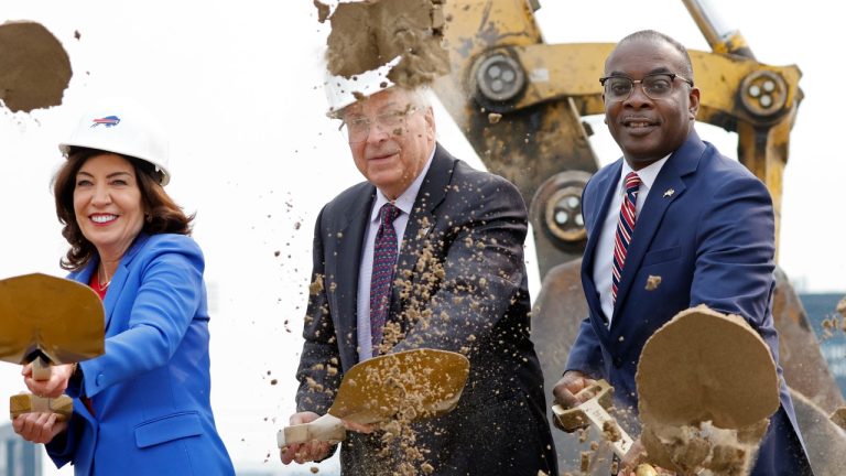 New York Governor Kathy Hochul, left, Buffalo Bills owner Terry Pegula and Buffalo Mayor Byron Brown, right, participate in the groundbreaking ceremony at the site of the new Bills Stadium in Orchard Park, N.Y., Monday June 5, 2023. (Jeffrey T. Barnes/AP)