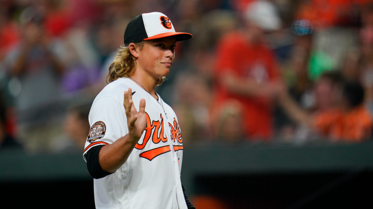 Jackson Holliday, the first overall draft pick by the Baltimore Orioles in the 2022 draft, is introduced onto the field before the start of the fourth inning of a baseball game between the Baltimore Orioles and the Tampa Bay Rays, Wednesday, July 27, 2022, in Baltimore. (AP)