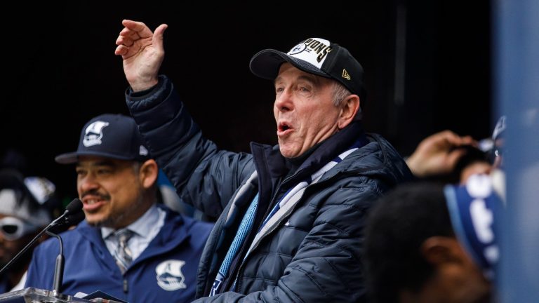 Larry Tanenbaum, chairman of Maple Leaf Sports & Entertainment speaks as the Toronto Argonauts host a rally to celebrate their Grey Cup win in downtown Toronto, Thursday, Nov. 23, 2022. (Cole Burston/THE CANADIAN PRESS)