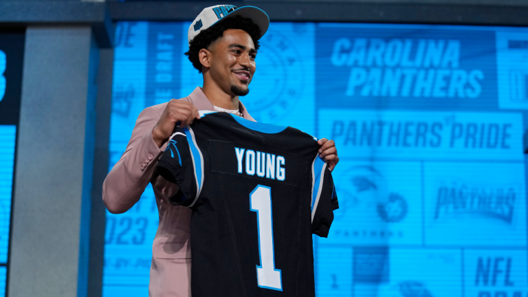 Alabama quarterback Bryce Young poses after being chosen by Carolina Panthers with the first overall pick during the first round of the NFL football draft, Thursday, April 27, 2023, in Kansas City, Mo. (AP Photo/Jeff Roberson)