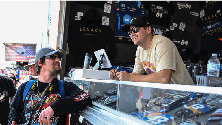 Noah Gragson, right, greets fans prior to the NASCAR All-Star Cup Series auto race at North Wilkesboro Speedway, Sunday, May 21, 2023, in North Wilkesboro, N.C. (AP Photo/Matt Kelley)