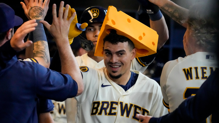 Milwaukee Brewers' Willy Adames celebrates after hitting a two-run home run during the first inning of a baseball game against the Houston Astros Wednesday, May 24, 2023, in Milwaukee. (AP Photo/Morry Gash)