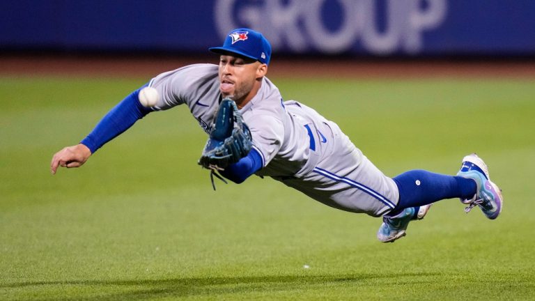 Toronto Blue Jays outfielder George Springer dives to catch a ball hit by New York Mets' Pete Alonso for an out during the seventh inning of a baseball game Friday, June 2, 2023, in New York. (Frank Franklin II/AP) 