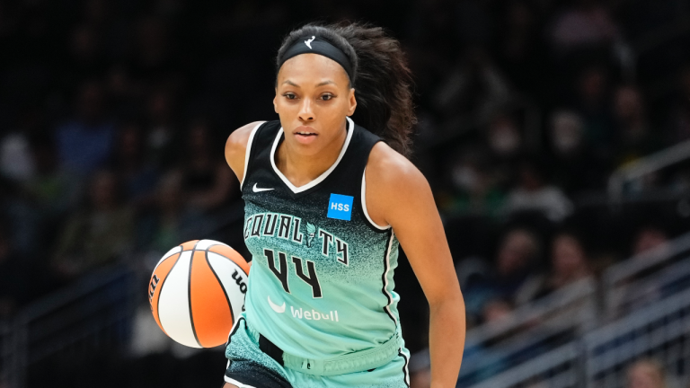 New York Liberty guard Betnijah Laney (44) moves the ball against the Seattle Storm during the first half of a WNBA basketball game, Tuesday, May 30, 2023, in Seattle. (AP Photo/Lindsey Wasson)