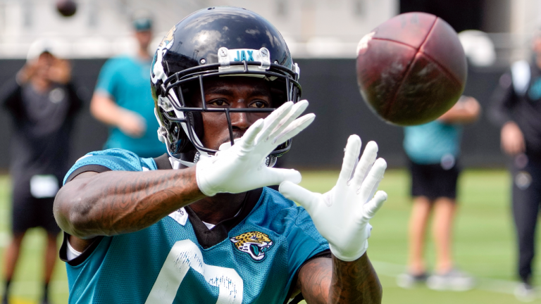 Jacksonville Jaguars wide receiver Calvin Ridley (0) catches a pass during an NFL football practice, Monday, June 5, 2023, in Jacksonville, Fla. (AP Photo/John Raoux)