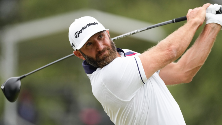 Dustin Johnson watches his tee shot on the fifth hole during the second round of the U.S. Open golf tournament at Los Angeles Country Club on Friday, June 16, 2023, in Los Angeles. (AP Photo/Marcio J. Sanchez)