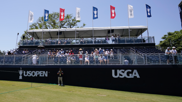 Fans sit in the stands on the 18th hole during the third round of the U.S. Open golf tournament at Los Angeles Country Club on Saturday, June 17, 2023, in Los Angeles. (AP Photo/George Walker IV)