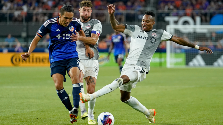 Toronto FC midfielder Mark-Anthony Kaye, right, battles against FC Cincinnati forward Yuya Kubo (7) during an MLS soccer match Wednesday, June 21, 2023, in Cincinnati. (AP)