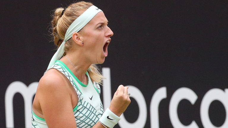 Czech Republic's Petra Kvitova reacts after winning a point against Croatia's Donna Vekic during their final WTA singles match at the Berlin Tennis Open, in Berlin, Sunday, June 25, 2023. (Wolfgang Kumm/dpa via AP) 