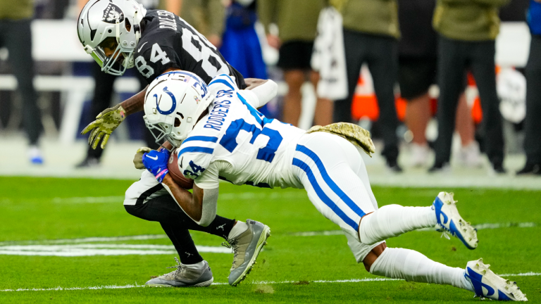 Indianapolis Colts cornerback Isaiah Rodgers Sr. (34) breaks up a pass intended for Las Vegas Raiders wide receiver Keelan Cole (84) in the first half of an NFL football game in Las Vegas, Sunday, Nov. 13, 2022. (AP)