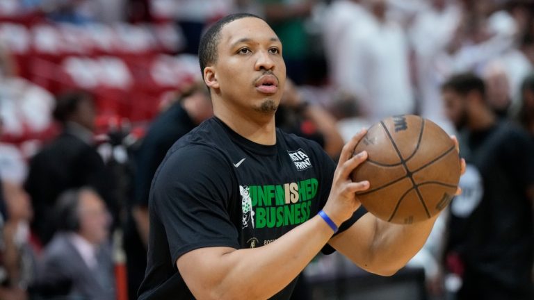 Boston Celtics forward Grant Williams (12) warms up before Game 4 of the NBA basketball playoffs Eastern Conference finals against the Miami Heat, Tuesday, May 23, 2023, in Miami. (Wilfredo Lee/AP)