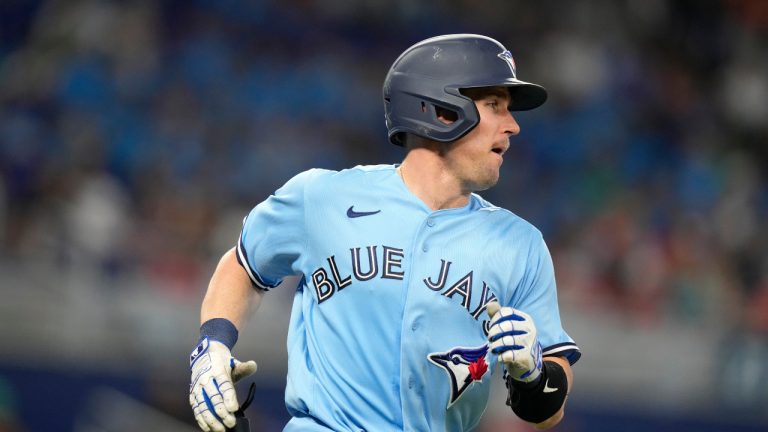 Toronto Blue Jays' Tyler Heineman runs after hitting a single during the fourth inning of a baseball game against the Miami Marlins, Wednesday, June 21, 2023, in Miami. (Lynne Sladky/AP)