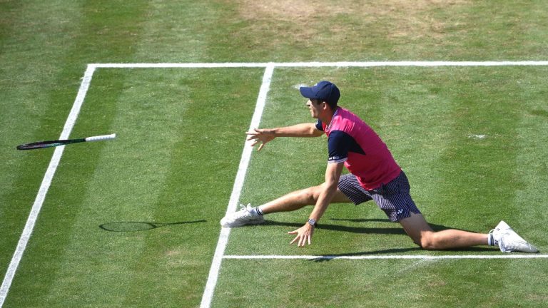 Poland's Hubert Hurkacz loses his racket during his semi-final match of the Stuttgart Open against Germany's Jan-Lennard Struff, in Stuttgart, Germany, Saturday, June 17, 2023. (Marijan Murat/dpa via AP)