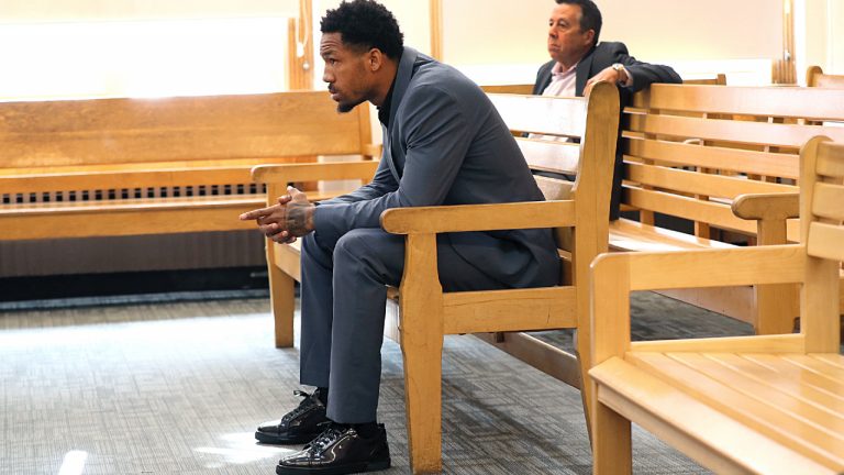 New England Patriots cornerback Jack Jones is seated at his arraignment on gun charges at East Boston Municipal Court, Tuesday, June 20, 2023, in Boston, Mass. Jones was charged with carrying two loaded guns in his carry-on luggage at Logan Airport. (Suzanne Kreiter/The Boston Globe via AP)