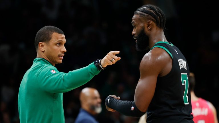 Boston Celtics coach Joe Mazzulla talks with Jaylen Brown during the second half of the team's NBA basketball game against the Washington Wizards, Sunday, Nov. 27, 2022, in Boston. (Mary Schwalm/AP)