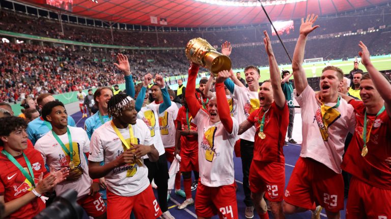 RB Leipzig players celebrate after winning the trophy in the German soccer cup, DFB Pokal, final match between RB Leipzig and Eintracht Frankfurt at Olympiastadion in Berlin, Germany, Saturday, June 3, 2023. (Andreas Gora/AP)