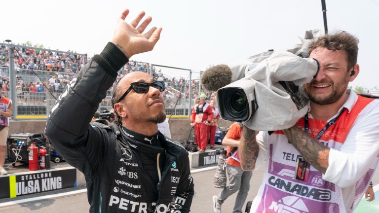 Mercedes driver Lewis Hamilton of Great Britain, waves to the crowd during a suspended first practice session at the Canadian Grand Prix in Montreal, Friday, June 16, 2023. THE CANADIAN PRESS/Paul Chiasson