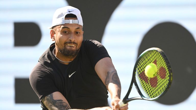 Australia's Nick Kyrgios returns the ball to China's Wu Yibing during the Stuttgart tennis tournament, Germany, Tuesday, June 13, 2023. (Marijan Murat/dpa via AP)