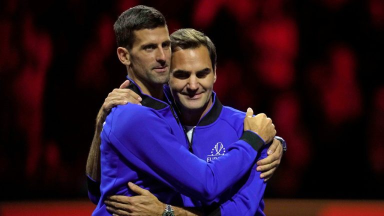 Team Europe's Novak Djokovic and Roger Federer embrace at the end of the third day of the Laver Cup tennis tournament in London, Sunday, Sept. 25, 2022. (Kin Cheung/AP)