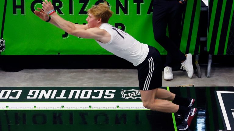 Oliver Moore participates in the horizontal jump during the NHL hockey combine, Saturday, June 10, 2023, in Buffalo, N.Y. (AP Photo/Jeffrey T. Barnes)