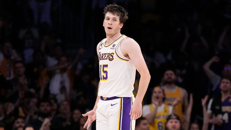 Los Angeles Lakers guard Austin Reaves reacts after scoring against the Denver Nuggets in the second half of Game 3 of the NBA basketball Western Conference Final series. (Mark J. Terrill/AP)