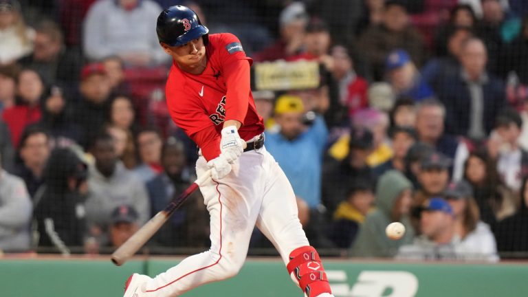 Boston Red Sox's Rob Refsnyder (30) swings at a pitch in the second inning of a baseball game against the Seattle Mariners, Wednesday, May 17, 2023, in Boston. (Steven Senne/AP)