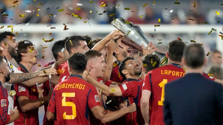 Spain players celebrate with the trophy after winning the Nations League final soccer match between Croatia and Spain at De Kuip stadium in Rotterdam, Netherlands, Sunday, June 18, 2023. Spain won 5-4 in a penalty shootout after the match ended tied 0-0. (Peter Dejong/AP)