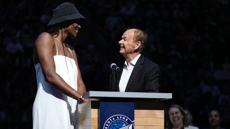 Minnesota Lynx owner Glen Taylor, right, speaks to former Lynx player Sylvia Fowles as her jersey number is retired following a WNBA basketball game between the Minnesota Lynx and Los Angeles Sparks, Sunday, June 11, 2023, in Minneapolis. (Abbie Parr/AP)