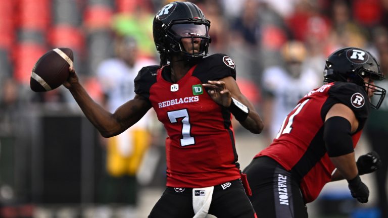 Ottawa Redblacks quarterback Tyrie Adams (7) throws the ball during first half CFL football action against the Edmonton Elks in Ottawa on Friday, June 30, 2023. (Justin Tang/CP)