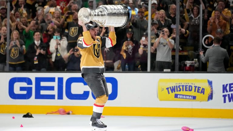 Vegas Golden Knights right wing Reilly Smith (19) skates with the Stanley Cup after the Knights defeated the Florida Panthers 9-3 in Game 5 of the NHL hockey Stanley Cup Finals Tuesday, June 13, 2023, in Las Vegas. The Knights won the series 4-1. (John Locher/AP)