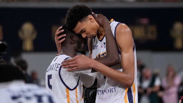 Boulogne-Levallois' Victor Wembanyama, right, reacts with teammate Lahaou Konate, left, during the playoffs of the Elite basketball match Boulogne-Levallois against Monaco at the Roland Garros stadium in Paris, Thursday, June 15, 2023. (Thibault Camus/AP)