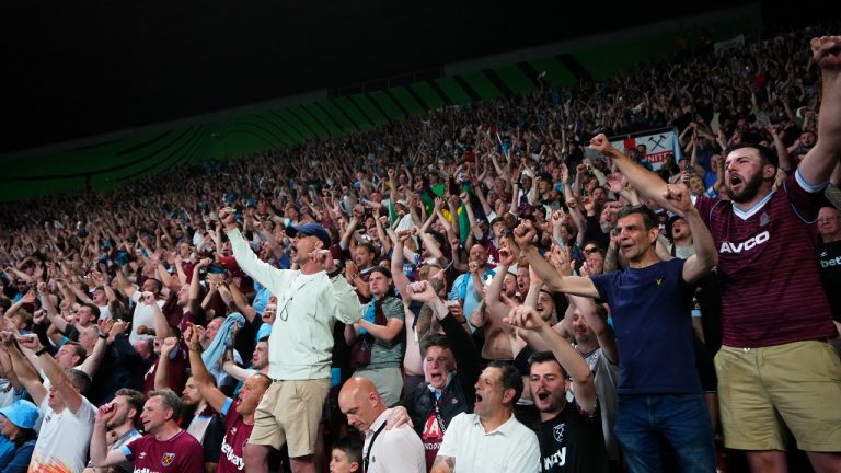 West Ham fans celebrate after winning the Europa Conference League final soccer match between Fiorentina and West Ham at the Eden Arena in Prague, Wednesday, June 7, 2023. West Ham won 2-1. (Petr David Josek/AP)