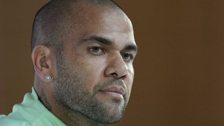 Brazil's Dani Alves listens to a question during a press conference on the eve of the group G of World Cup soccer match between Brazil and Cameroon in Doha, Qatar, on Dec. 1, 2022. (AP)