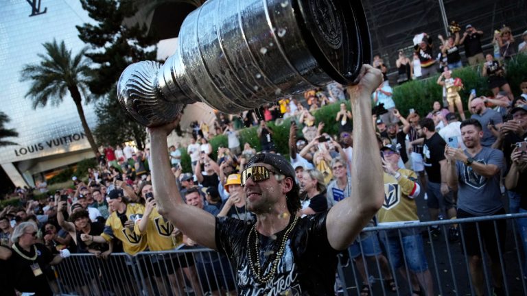 Vegas Golden Knights defenseman Nicolas Hague celebrates with the Stanley Cup during a parade along the Las Vegas Strip for the NHL hockey champions Saturday, June 17, 2023, in Las Vegas. (John Locher/AP)