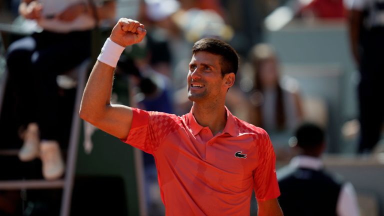 Serbia's Novak Djokovic celebrates after beating Peru's Juan Pablo Varillas in their fourth round match of the French Open tennis tournament at the Roland Garros stadium. (Thibault Camus/AP)