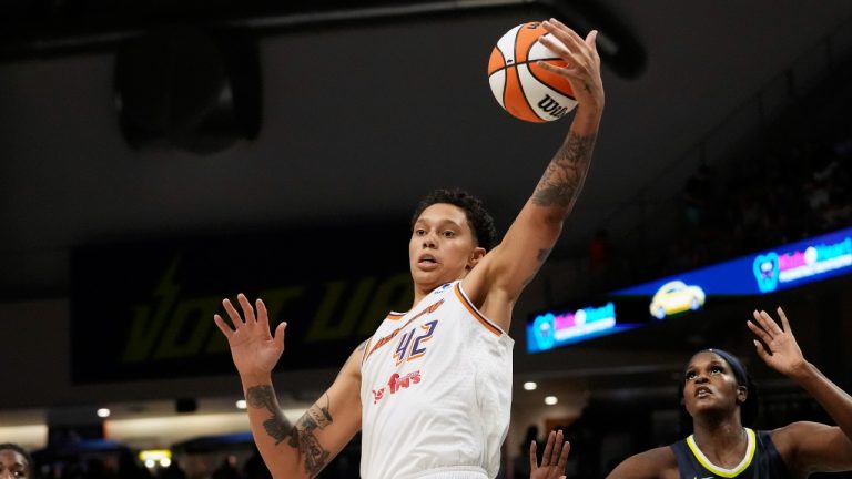 Phoenix Mercury center Brittney Griner (42) grabs a rebound in front of Phoenix Mercury forward Brianna Turner (21) during the second half of a WNBA basketball basketball game in Arlington, Texas, Friday, June 9, 2023. (AP)