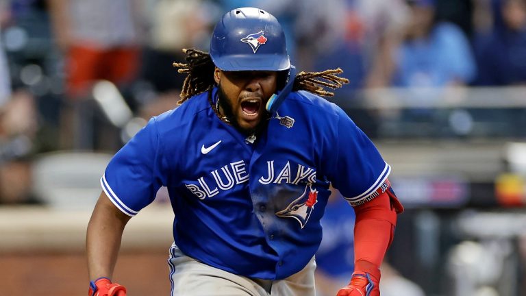 Vladimir Guerrero Jr. #27 of the Toronto Blue Jays reacts after hitting an RBI double during the ninth inning against the New York Mets at Citi Field on June 3, 2023 in the Queens borough of New York City. (Photo by Adam Hunger/Getty Images)