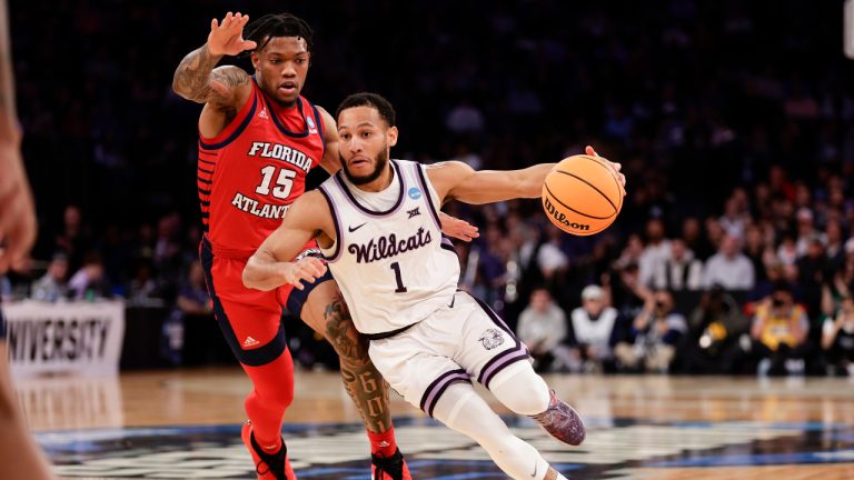 Kansas State's Markquis Nowell (1) drives the ball against Florida Atlantic's Alijah Martin (15) in the first half of an Elite 8 college basketball game in the NCAA Tournament's East Region final, Saturday, March 25, 2023, in New York. (Adam Hunger/AP)