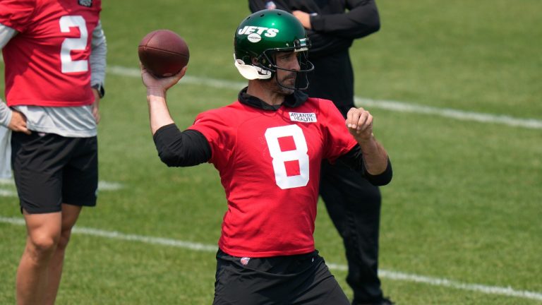 New York Jets quarterback Aaron Rodgers (8) throws during a drill at the NFL football team's training facility in Florham Park, N.J., Tuesday, June 6, 2023. (AP)