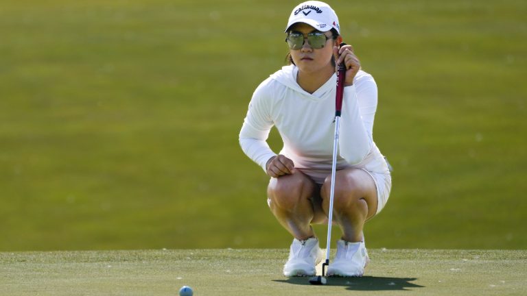 Rose Zhang lines up her shot the third green during the first round of the Mizuho Americas Open golf tournament, Thursday, June 1, 2023, at Liberty National Golf Course in Jersey City, N.J. (John Minchillo/AP)