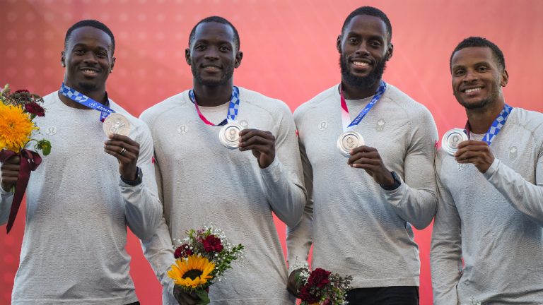 Aaron Brown, from left to right, Jerome Blake, Brendon Rodney and Andre De Grasse pose with their Tokyo Olympics silver medals after being awarded the upgraded medals during a ceremony at the Canadian track and field championships, in Langley, B.C., on Saturday, July 29, 2023. (Darryl Dyck/CP)