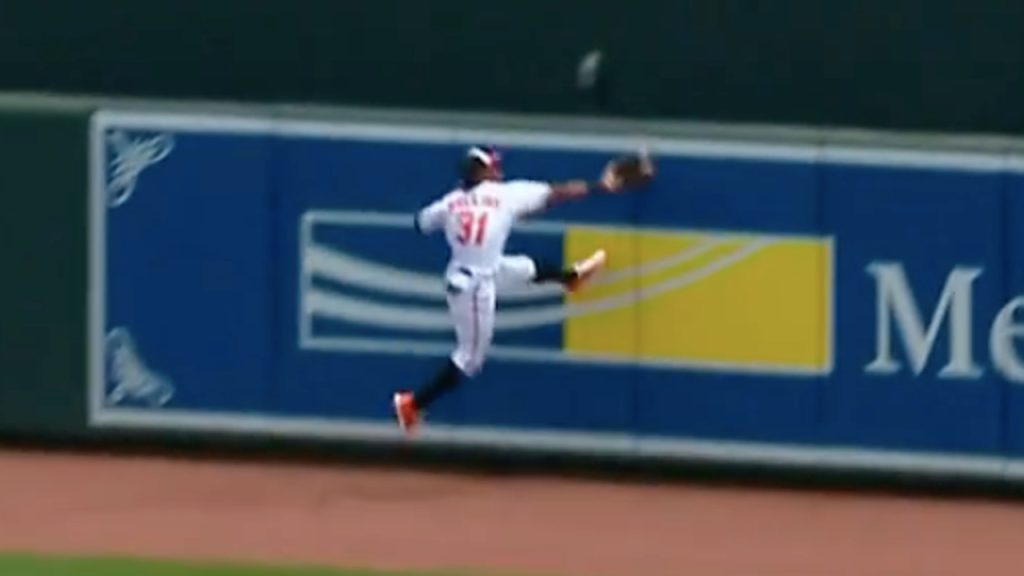 Orioles' Mullins leaps to pull off insane catch at the wall in deep centre  field