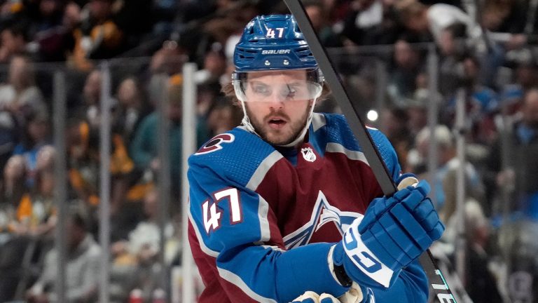 Colorado Avalanche forward Alex Galchenyuk adjusts his pads during the second period of an NHL hockey game Wednesday, March 22, 2023, in Denver.  (David Zalubowski/AP)