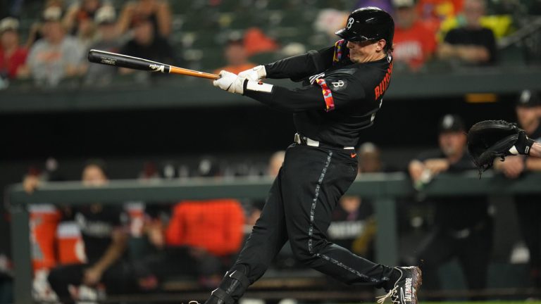 Baltimore Orioles' Adley Rutschman follows through on a swing against the Seattle Mariners during the fourth inning of a baseball game, Friday, June 23, 2023, in Baltimore. (Julio Cortez/AP)