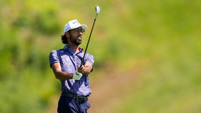 Akshay Bhatia watches his shot on the first fairway during the third round of the John Deere Classic golf tournament, Saturday, July 8, 2023, at TPC Deere Run in Silvis, Ill. (Charlie Neibergall/AP)