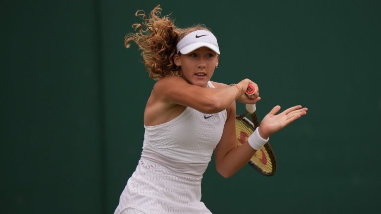 Russia's Mirra Andreeva plays a return to Russia's Anastasia Potapova during the women's singles match on day seven of the Wimbledon tennis championships. (Alberto Pezzali/AP)